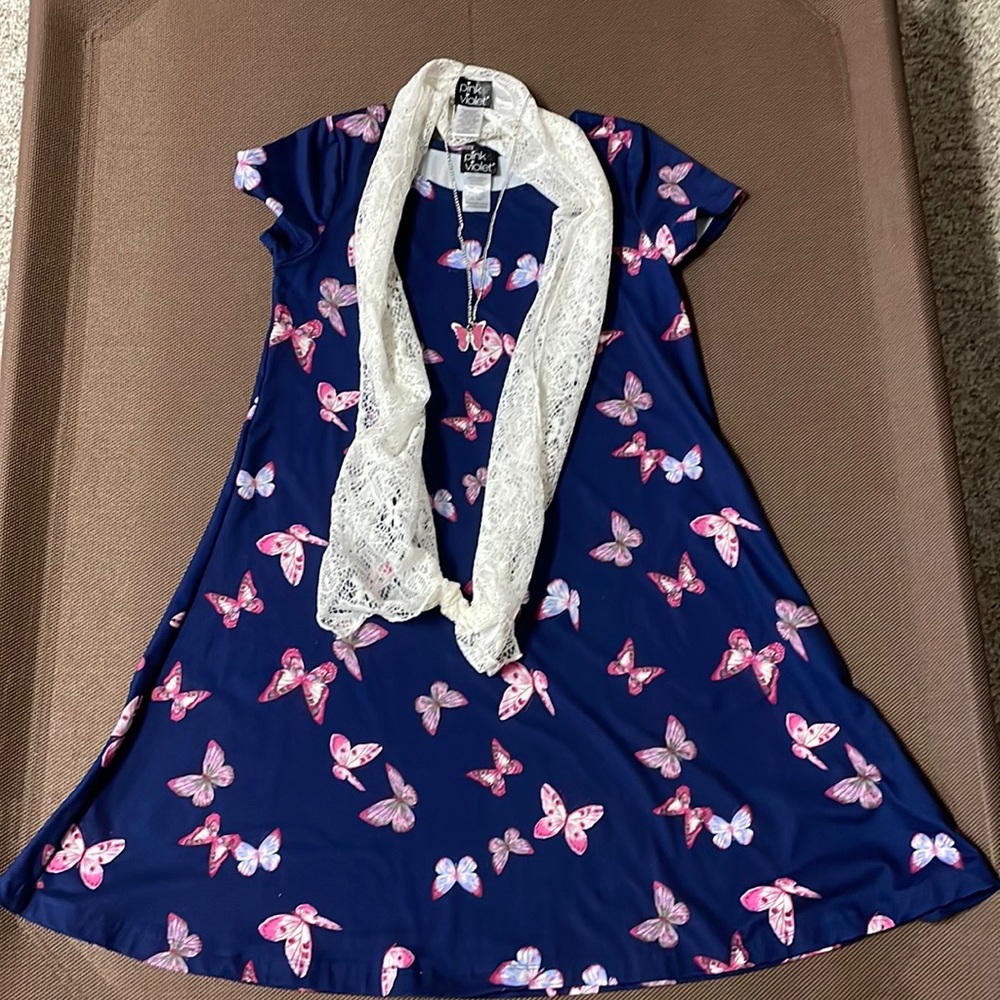 Girls butterfly pattern dress.  Excellent condition.
